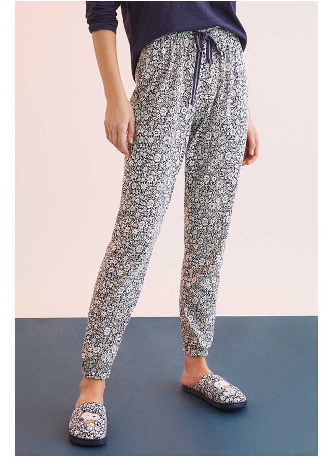 Long flower print trousers