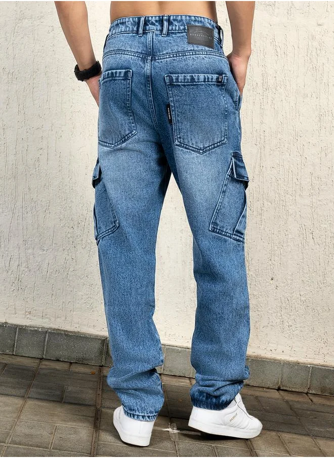 Hubberholme Mid Rise Relaxed Fit Faded Cargo Jeans by Styli