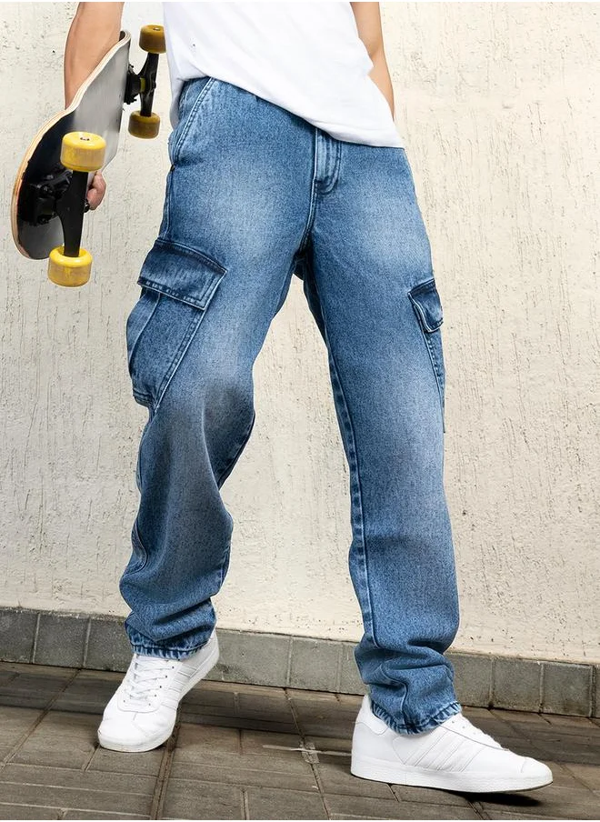 Hubberholme Mid Rise Relaxed Fit Faded Cargo Jeans by Styli