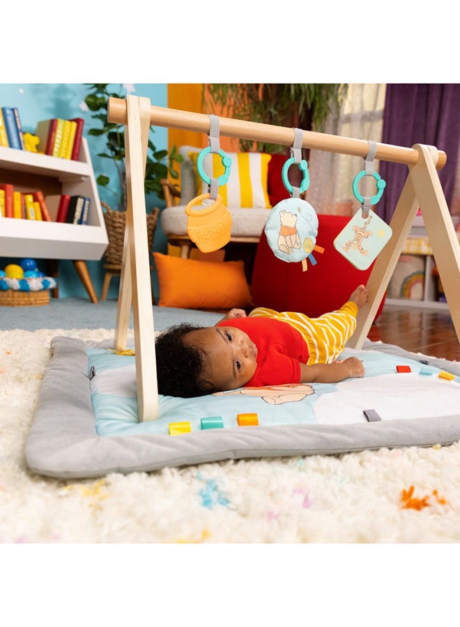 Bright Starts - Disney Winnie The Pooh Once Upon a Tummy Time Baby Activity Mat with Wooden Toy Bar, Blue, 0 - 18 months - Image 2