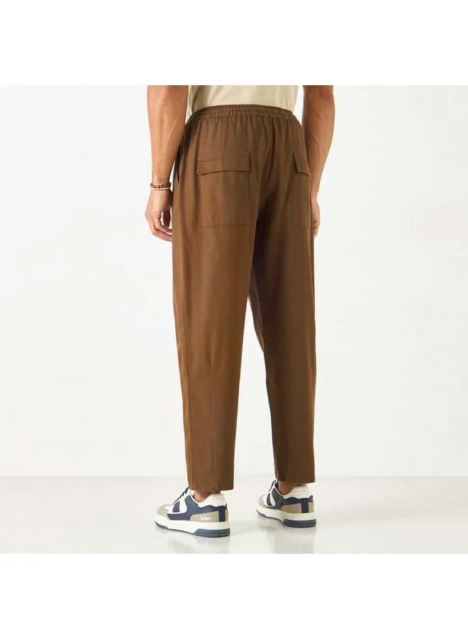 Iconic Solid Flexi Waist Regular Fit Joggers with Drawstring Closure and Pockets