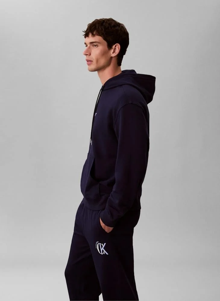 Calvin Klein Jeans Maritime Blue Graphic Terry Hoodie for Men | Best Price UAE