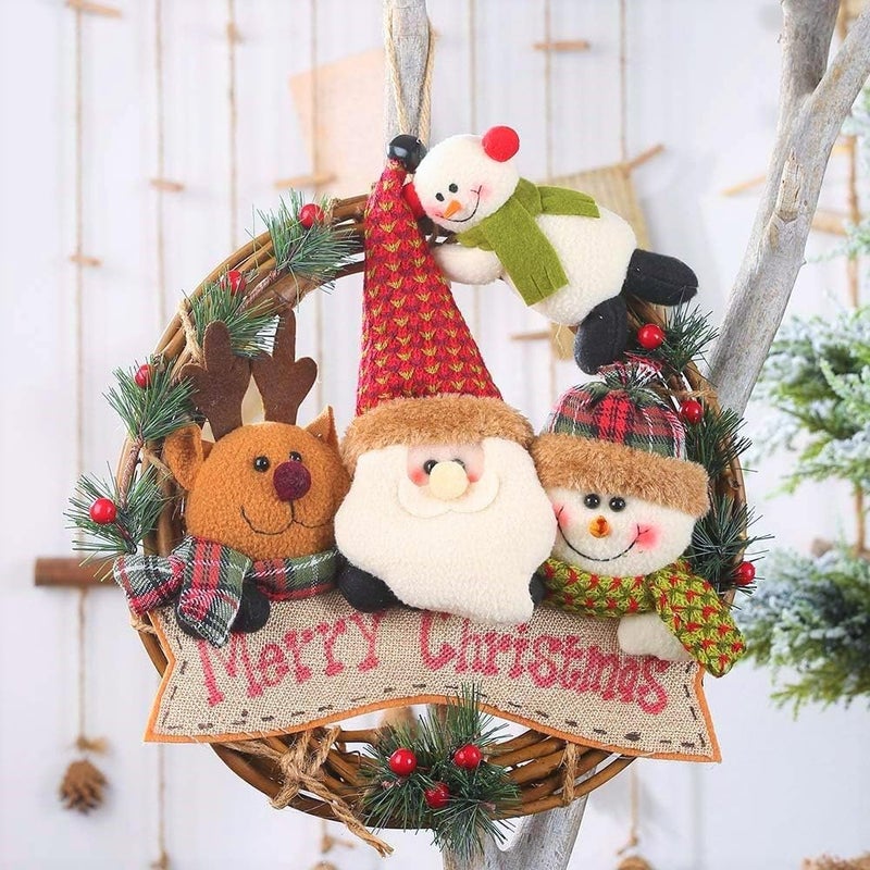 LATERN Christmas Doll Wreath 30CM Christmas Doll Hanging Wreath Artificial Rattan Pine Leaves Red Berries Wreath with Elk Santa Snowman Plush Doll for Xmas Front Door Wall Window Fireplace Decoration