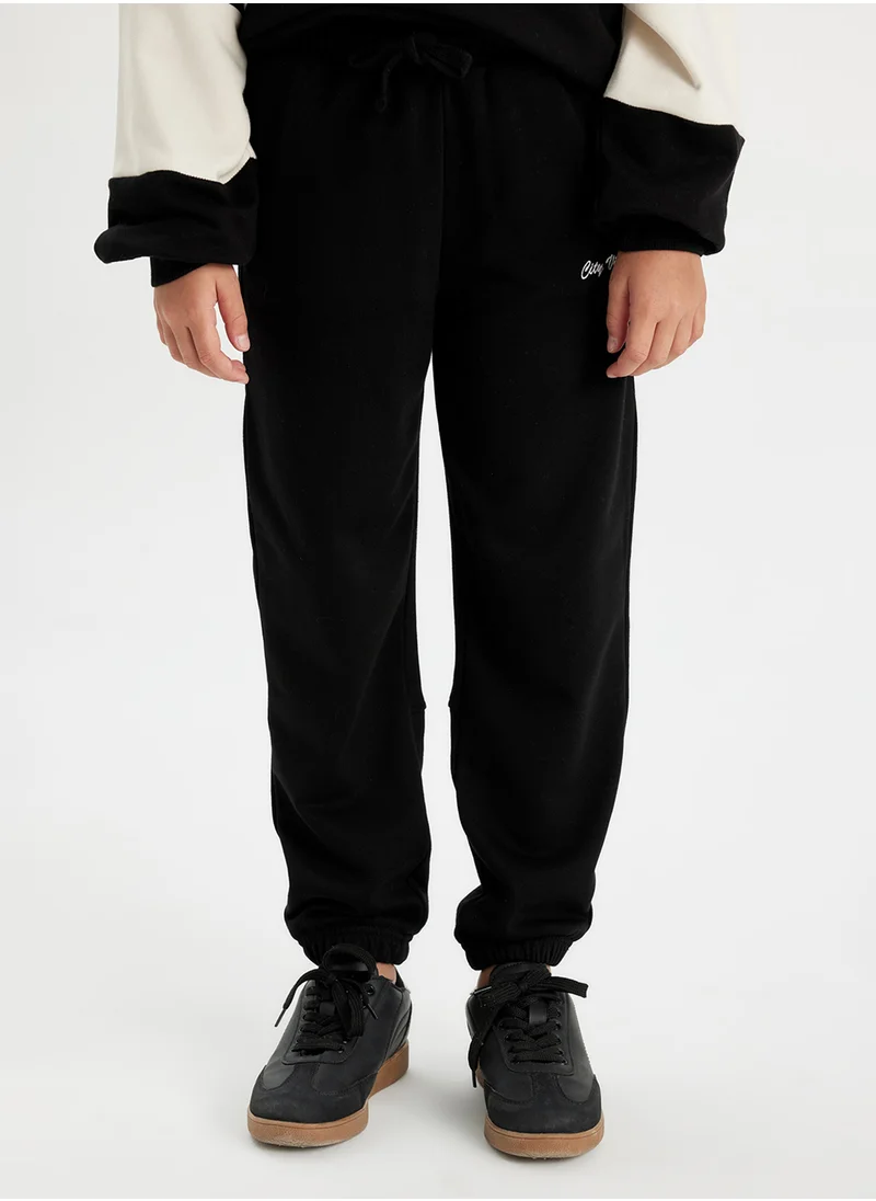 ديفاكتو Printed Elasticated Cuffed Black Jogger Pants With Pockets