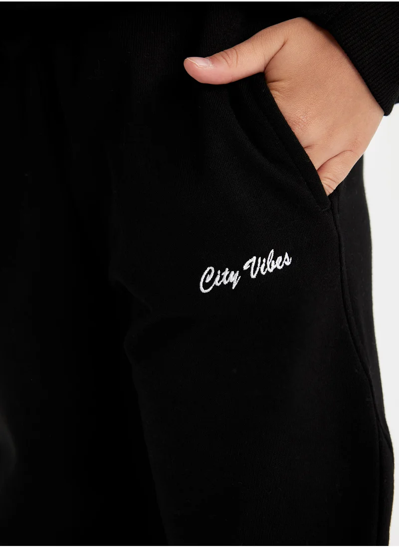 ديفاكتو Printed Elasticated Cuffed Black Jogger Pants With Pockets