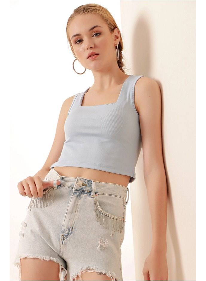 BIG DART Light Blue Crop Top - Image 1