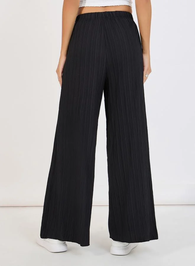 Styli Textured Palazzo Pants with Elastic Waistband