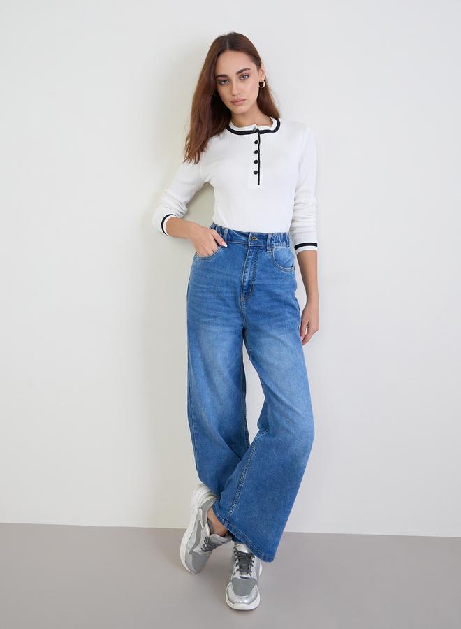 ستايلي بلوزة محبوك مضلع بلون أوف وايت مع حواف سوداء - Image 2