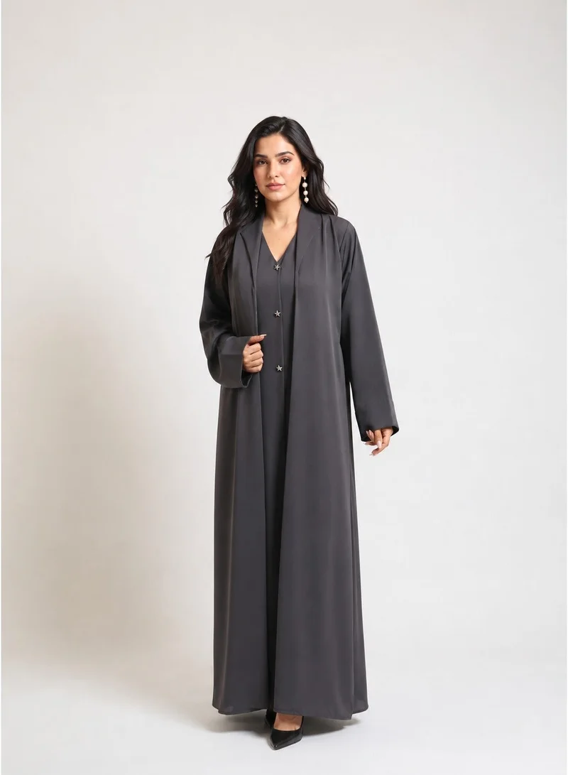 Nikias Grey nida abaya with collar and button and coat style look with very light weight and cuts