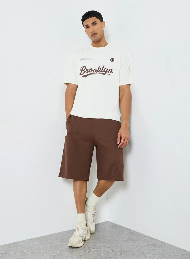 Styli Men Oversized Printed T-Shirt and Shorts Co-Ords