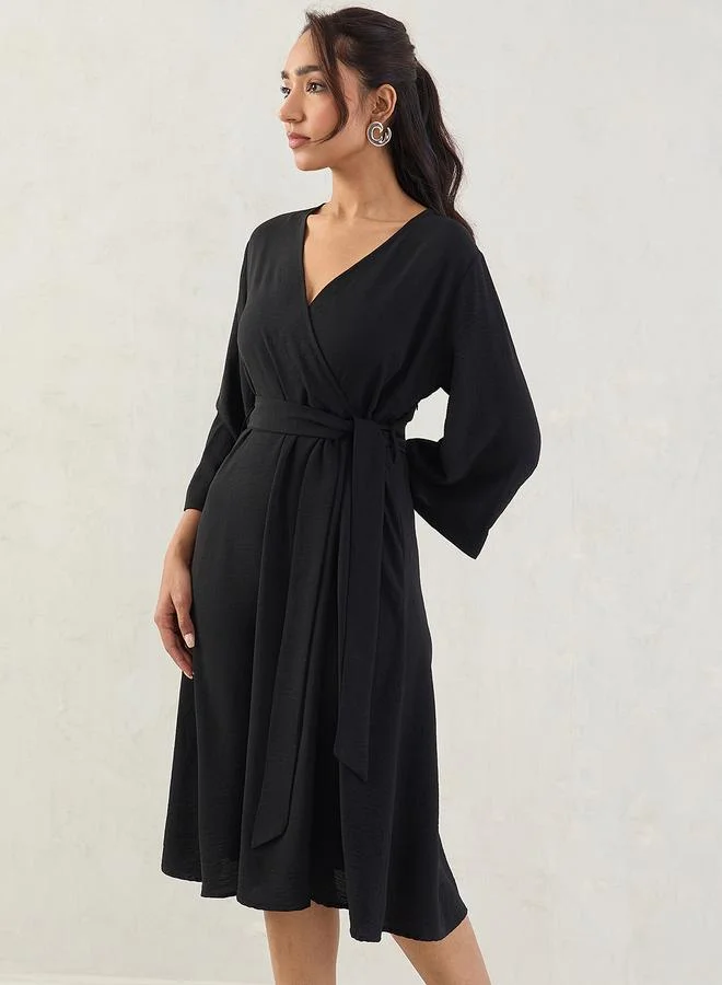 Femmella  Femmella Black Wrap Front Midi Dress with Tie Belt for Women | Best Price UAE