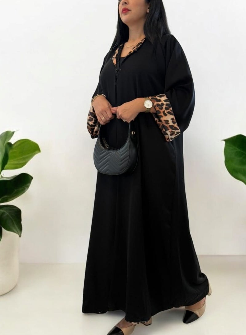 عباية قابلة للعكس – تصميم أنيق بلون أسود ونقشة الفهد بطابع عصري - Image 1