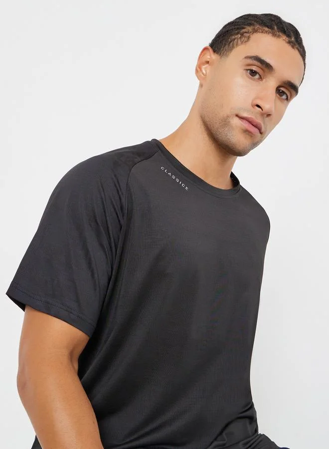 ستايلي اكتيف تيشيرت رياضي بقصة عادية سريع الجفاف بنسيج بارز