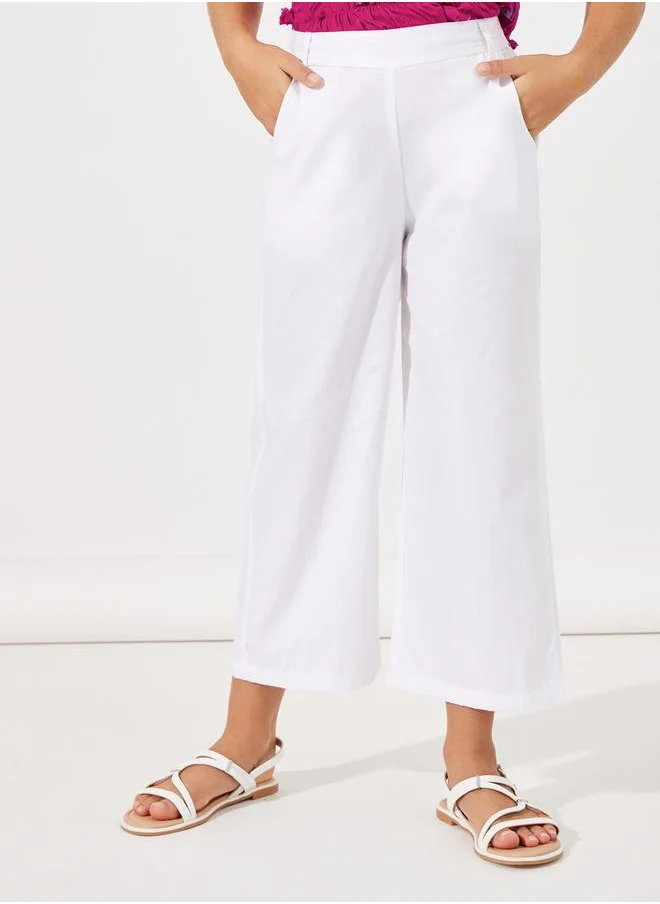 Styli Ruffled Peplum Top & Straight Leg Pants Set
