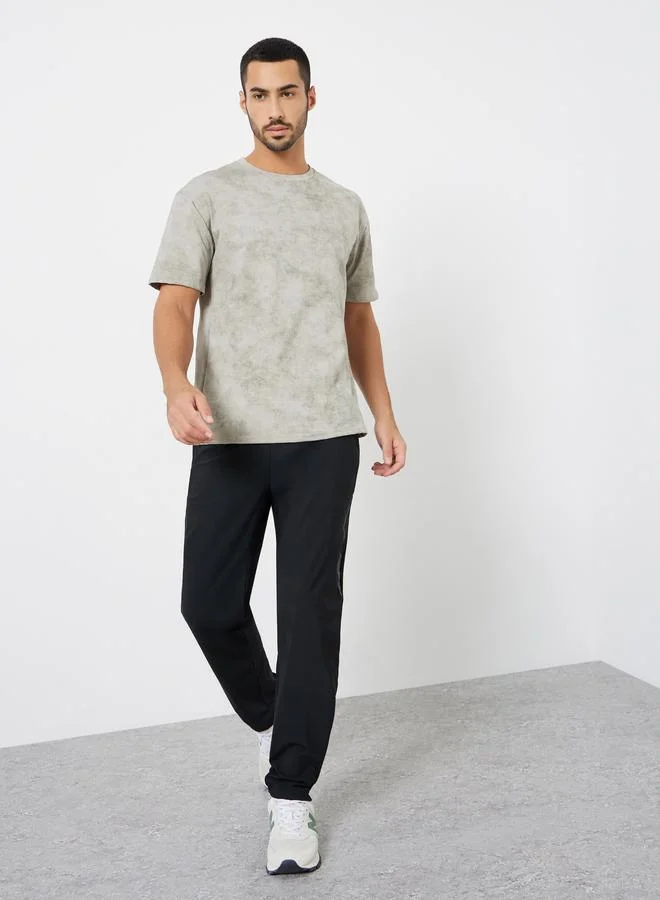 ستايلي اكتيف تيشيرت تدريب رجالي رمادي مطبوع بقصة مريحة