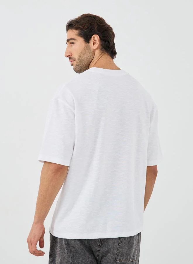 Styli Styli Crew Neck Textured Oversized T-Shirt with Chest Pocket