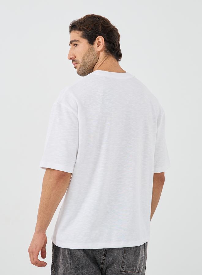 Styli Crew Neck Textured Oversized T-Shirt with Chest Pocket - Image 4