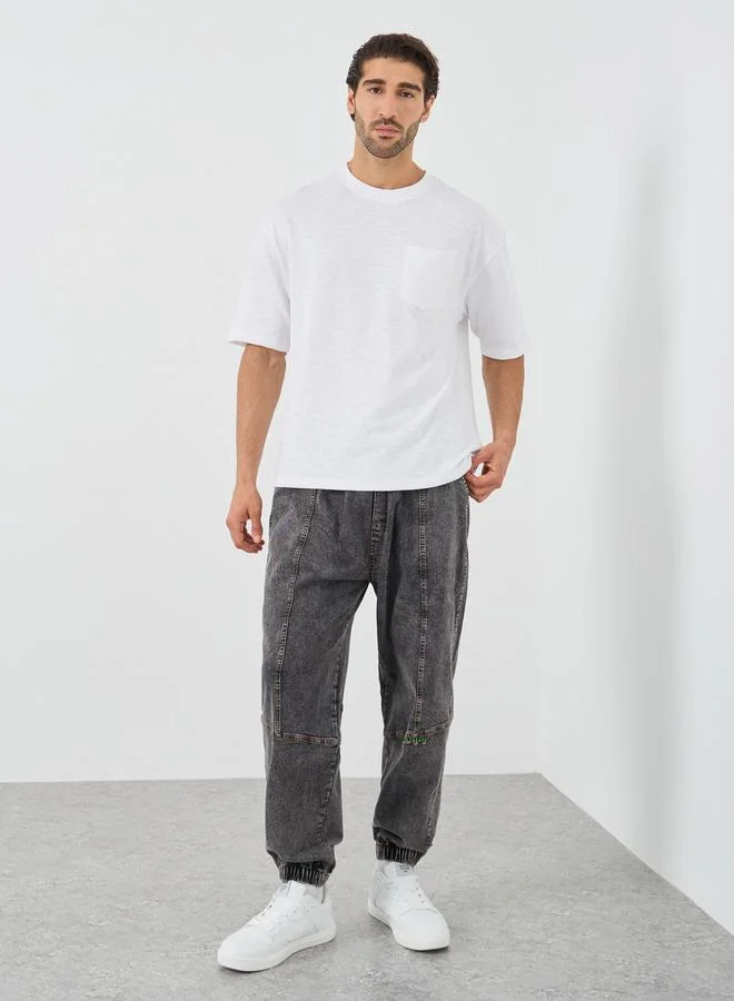 Styli Crew Neck Textured Oversized T-Shirt with Chest Pocket