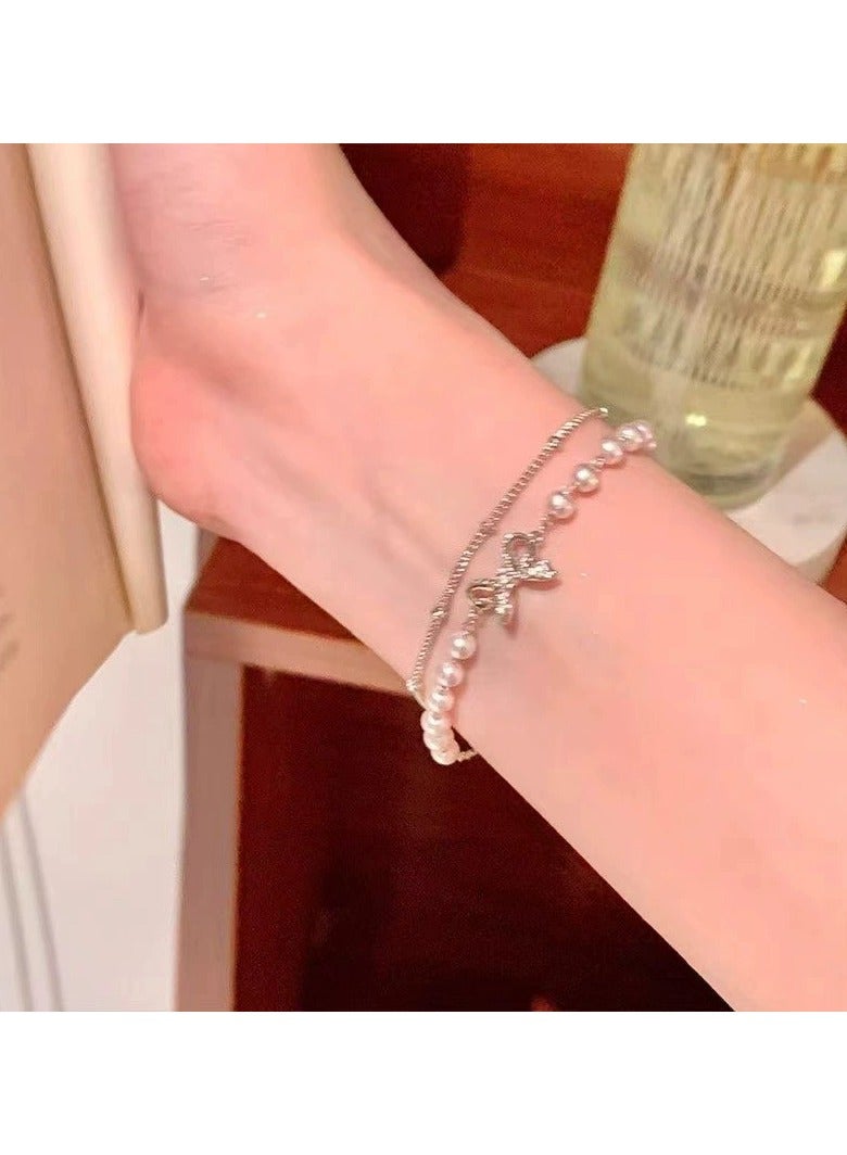 Goolsky Double-Layer Pearl Bow Bracelet – Dainty Layered Hand Chain, Elegant Gift for Girls & Students - Image 1