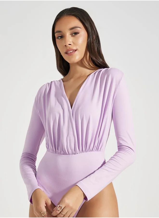 ستايلي V Neck Gathered Detail Knit Bodysuit