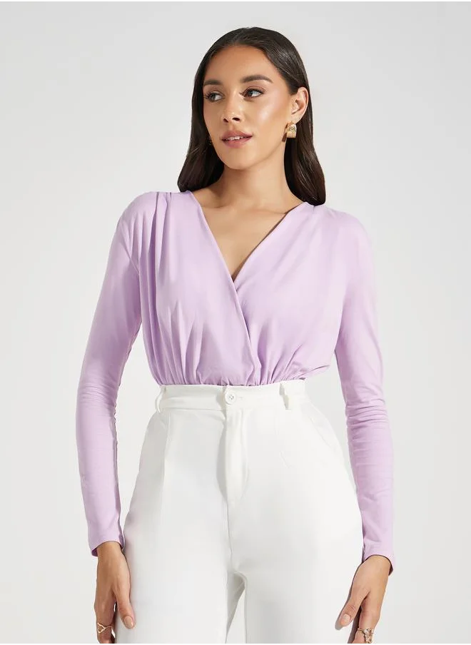 ستايلي V Neck Gathered Detail Knit Bodysuit