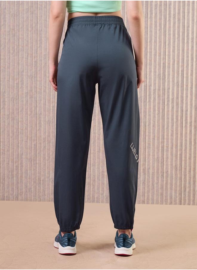 Technosport Technosport Women Grey Solid 2-Way Stretch Joggers  - Image 1