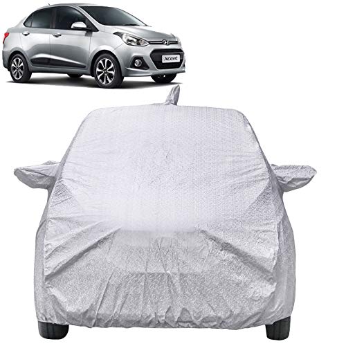 The Autostory Waterproof Car Body Cover Compatible with Hyundai Xcent, Shinning Silver Non Woven Material, Triple Stitched, With Mirror & Antenna Pockets, Adjustable Belt and Buckle, 3 Months Warranty - Image 1