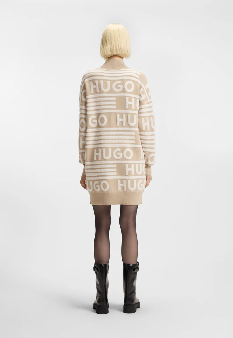 هوجو فستان سويتر بقصة واسعة وتفاصيل شعار