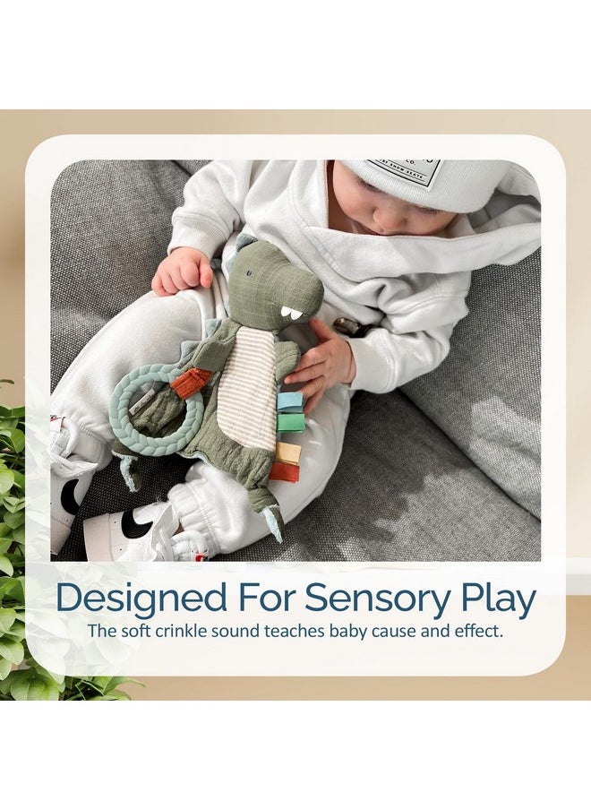 Itzy Ritzy Itzy Ritzy - Bitzy Crinkle Sensory Toy Dinosaur with Crinkle Sound for Babies & Toddlers - Features Soft Braided Teething Ring & Textured Ribbons, Designed for Ages 0 Months and Up, Dinosaur  - Image 5