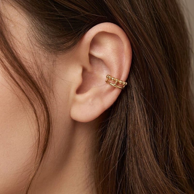 These distinctive gold earrings feature a row of prominent beads for an elegant and unique look. They require no piercing for easy wear and all-day comfort. - Image 3