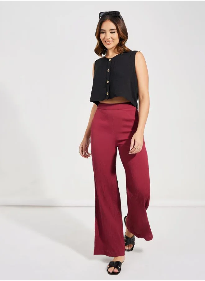 ستايلي Textured Wide Leg Pants with Concealed Zip