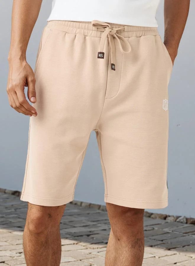 اس بي كاركترز شورتات مريحة بتطريز شعار الدوري الوطني لكرة القدم مع جيوب