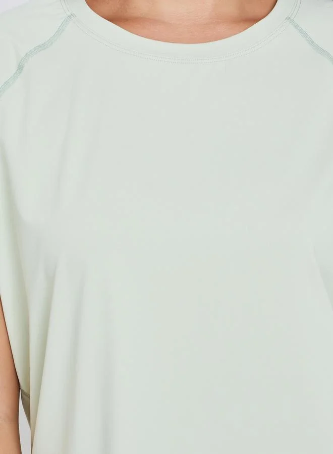 Styli Active Green Back V Shaped Mesh Insert Boxy Fit Top for Women | Best Price UAE