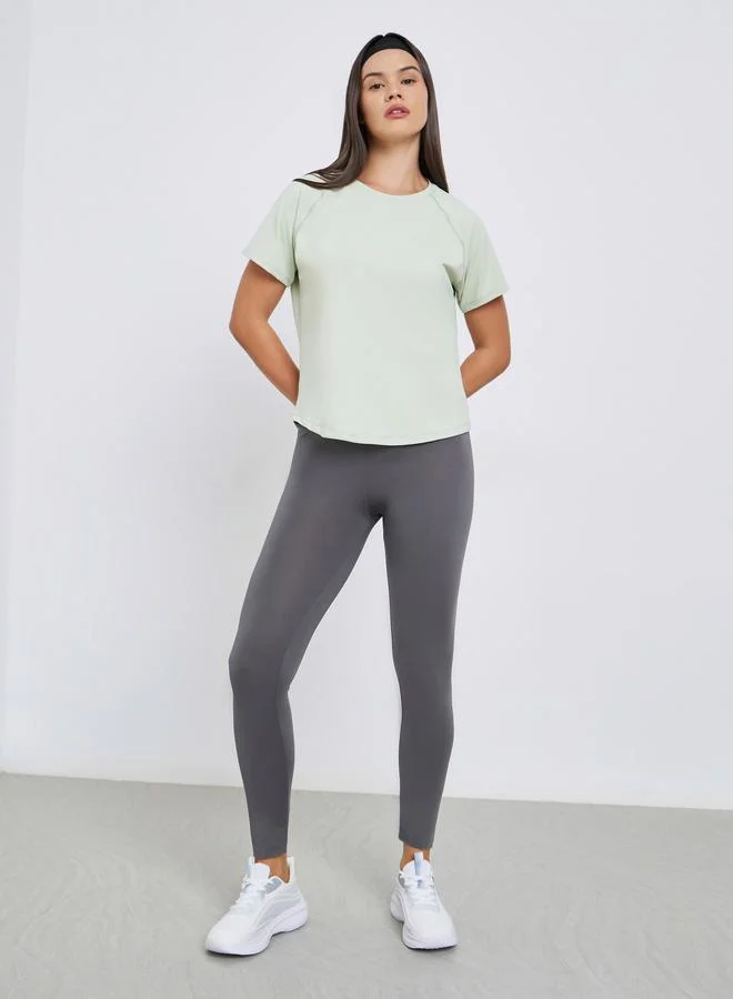 Styli Active Green Back V Shaped Mesh Insert Boxy Fit Top for Women | Best Price UAE