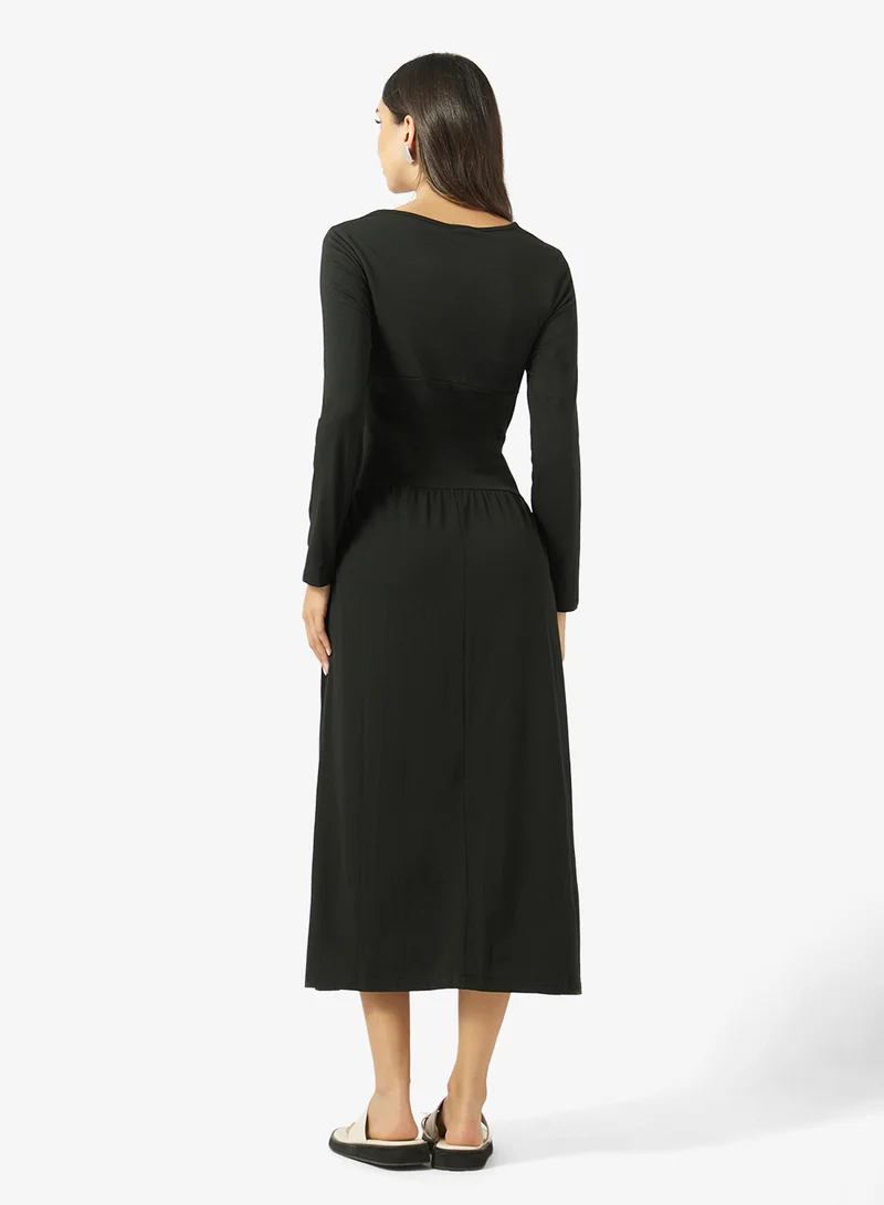 Ginger V Neck Drop Waist Pleat Detail Dress