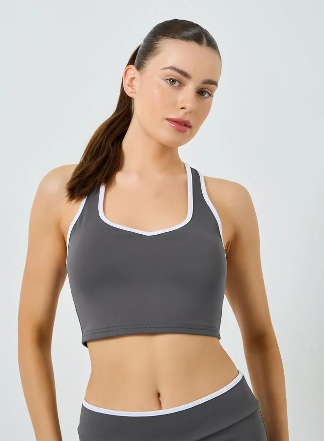 Styli Active  Contrast Edge Racerback Peep Sports Bra and Leggings Set for Women | Best Price UAE