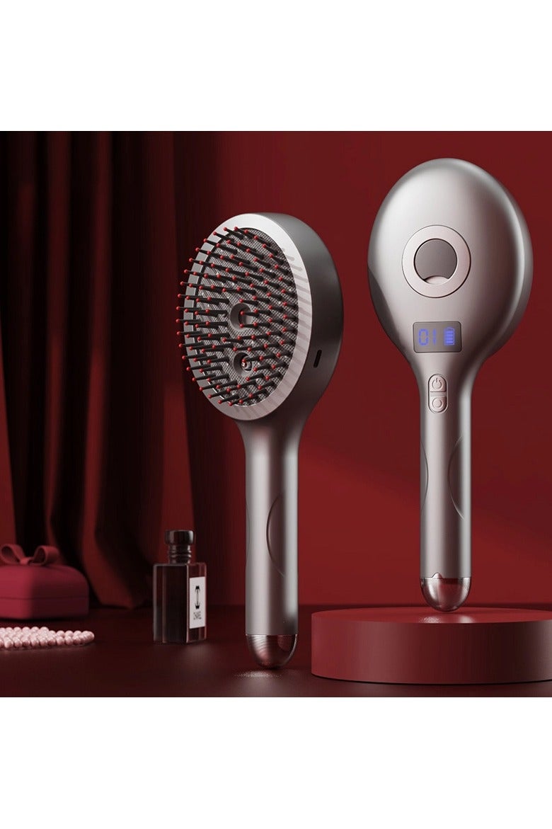 عام مشط تدليك رذاذ للعناية بالشعر مع تدليك اهتزازي وضوء أحمر، يرخي فروة الرأس ويعزّز العناية بالشعر. - Image 1