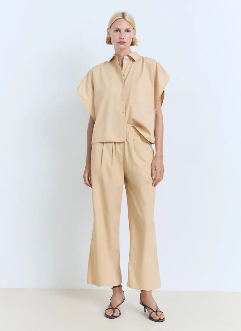 مانجو قميص بأكمام قصيرة واسع