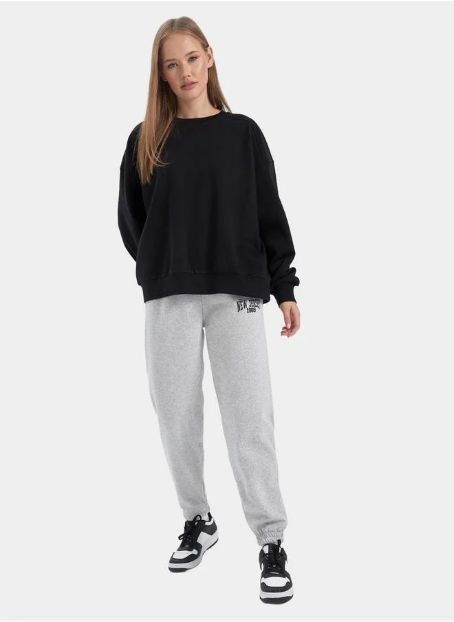 DeFacto Slogan Print Elasticated Cuff Jogger Sweatpants by Styli