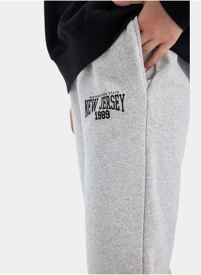 DeFacto Slogan Print Elasticated Cuff Jogger Sweatpants by Styli