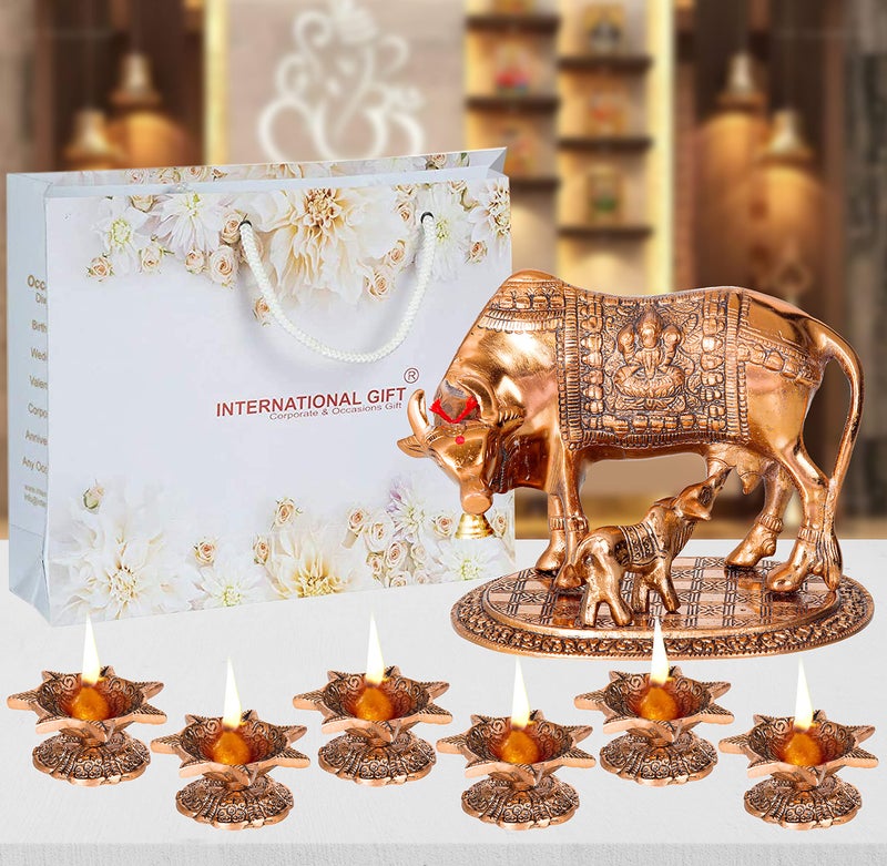 INTERNATIONAL GIFT® Copper Kamdhenu Cow with Calf Metal Statue Figurine with 6 Piece Jyot with Beautiful Velvet Box Packing and with Carry Bag (17H X 22W X 14L Centimeters) - Image 1