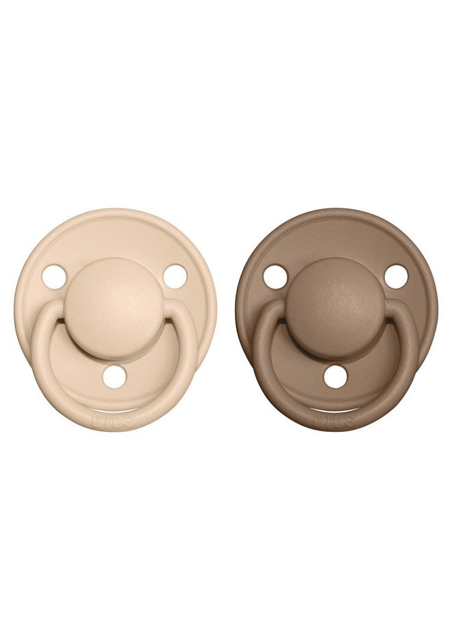 بيبس لهايات BIBS - مجموعة فاخرة | لهاية أطفال خالية من مادة BPA | صُنعت في الدنمارك | طقم من لهايتين فاخرتين بلون الفانيليا/البلوط الداكن | مقاس من ٦ إلى ١٨ شهرًا - Image 1