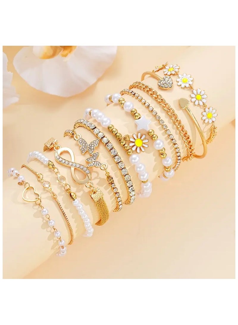 طقم أساور أنيق من ١٢ قطعة من اللؤلؤ الصناعي وزهرة الأقحوان - دلايات على شكل قلب ونجمة وفراشة للنساء | مثالي للعطلات والارتداء اليومي والهدايا - Image 1