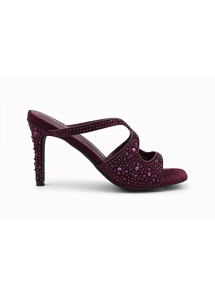 أيقون Heel slipper decorated with sparkling rhinestone accents.