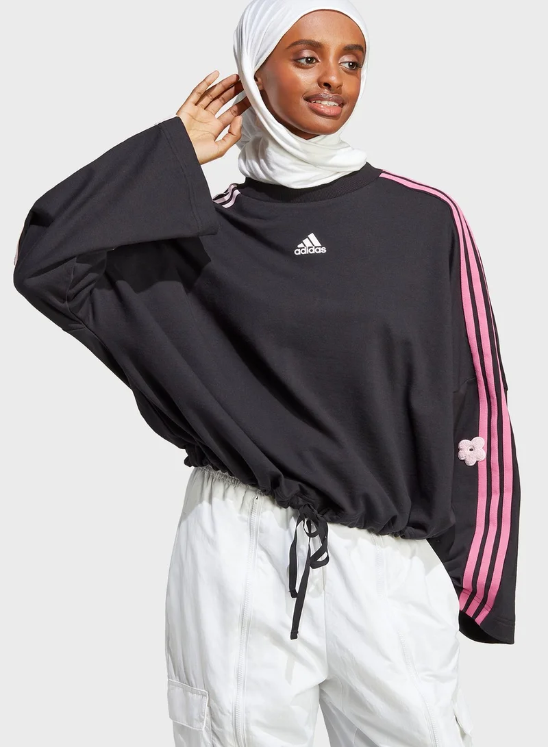 adidas سويت شيرت بطبعة زهرة وخطوط الماركة