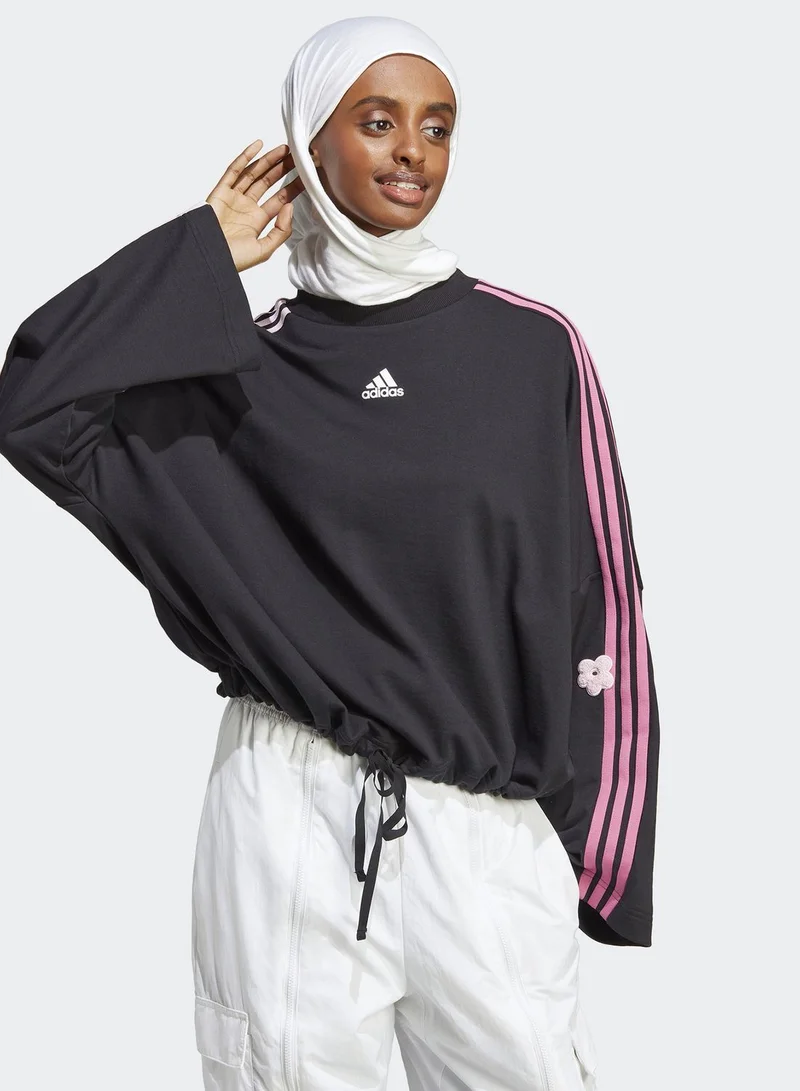 adidas سويت شيرت بطبعة زهرة وخطوط الماركة