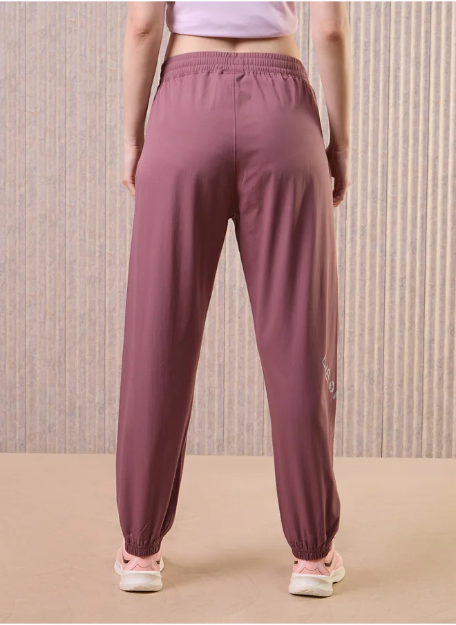 تكنوسبورت Women Solid 2-Way Stretch Joggers