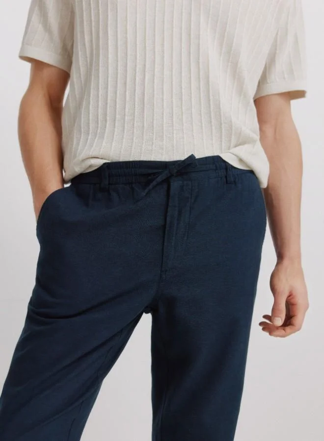Springfield  Linen/cotton drawstring elasticated waistband welt back pockets front coin pocket Comfort Slim fit trousers for Men | Best Price UAE