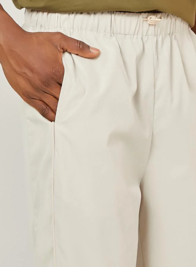 Styli  Piping Detail Straight Jogger with Drawcord Hem for Men | Best Price UAE