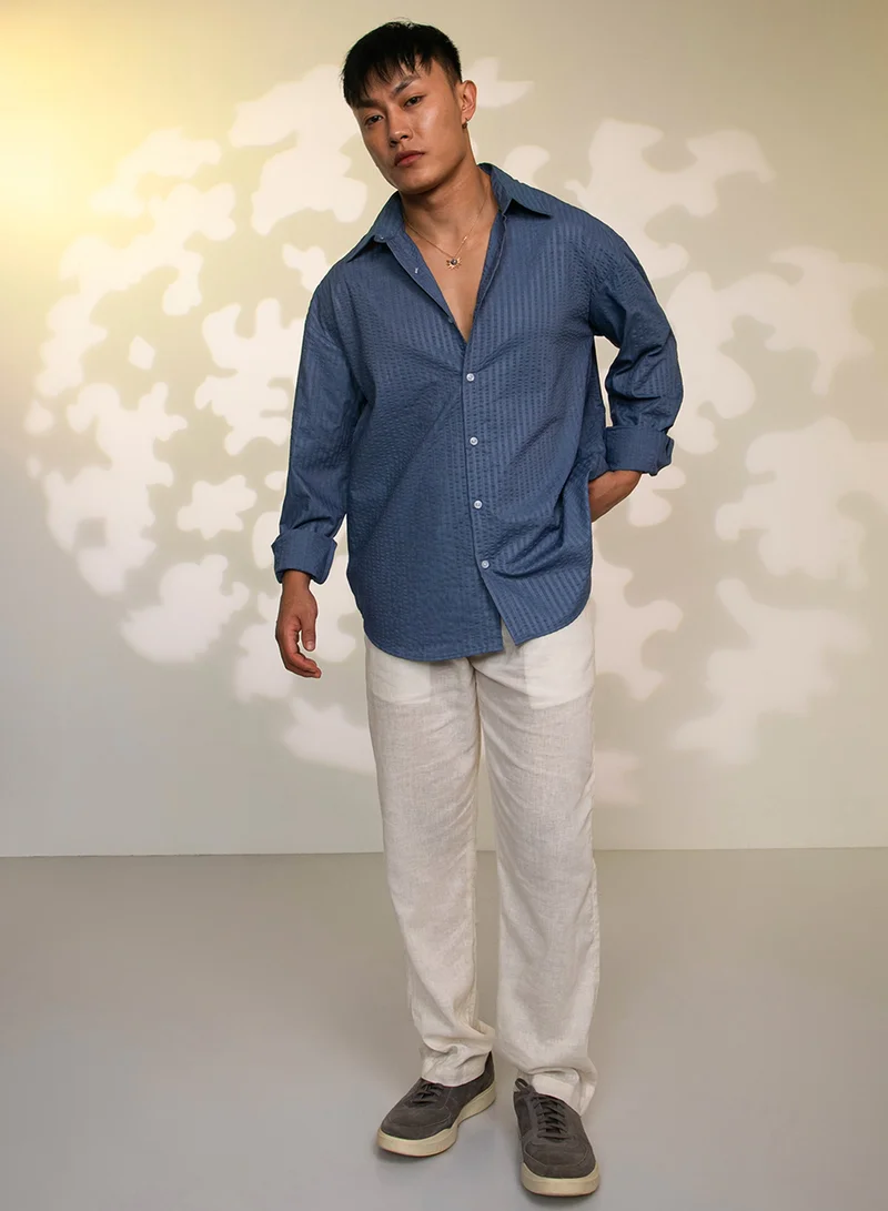 Campus Sutra Campus Sutra Men's Lapis Blue Candy-Textured Shirt For Casual Wear | Spread collor | Long Sleeve | Button Closure | Shirt Crafted With Comfort Fit For Everyday Wear